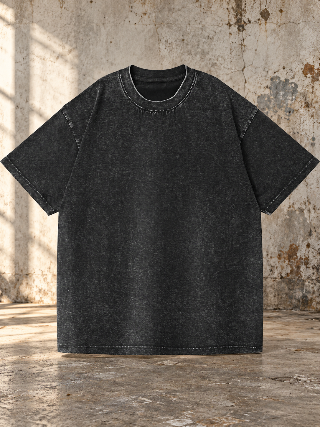 Illustrative workshop background; black washed cotton tee shown for style